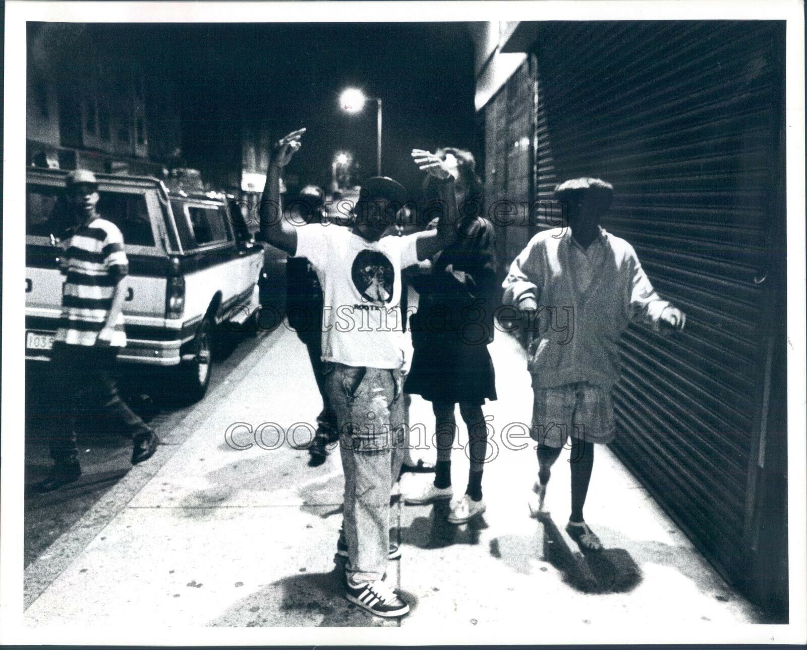 1994 Press Photo African American Youth on Sidewalk at Night 1990s Roxbury MA
