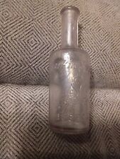 Larkin Soap Co. Buffalo Glass Bottle initials on the front. Embossed picture