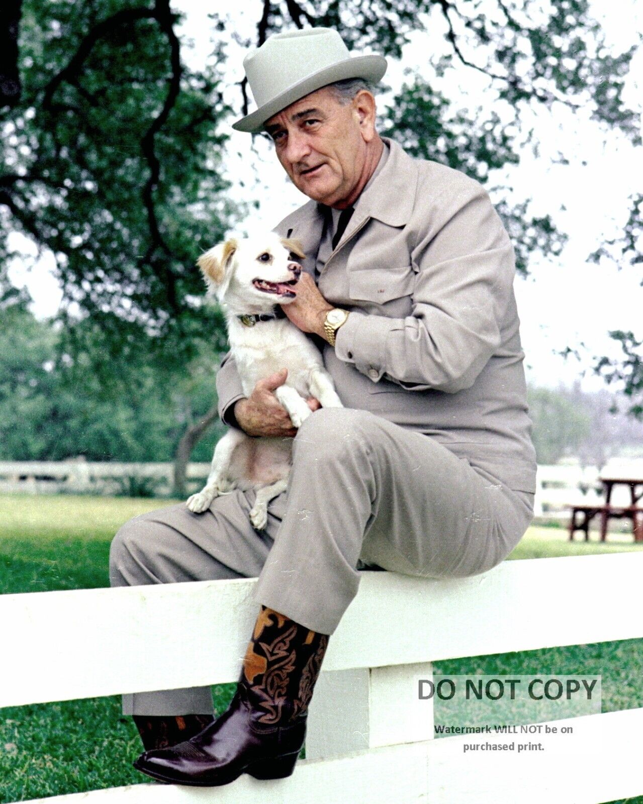 PRESIDENT LYNDON B. JOHNSON WITH HIS DOG 