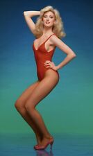 MORGAN FAIRCHILD - IN A RED TEDDIE - STANDING  picture