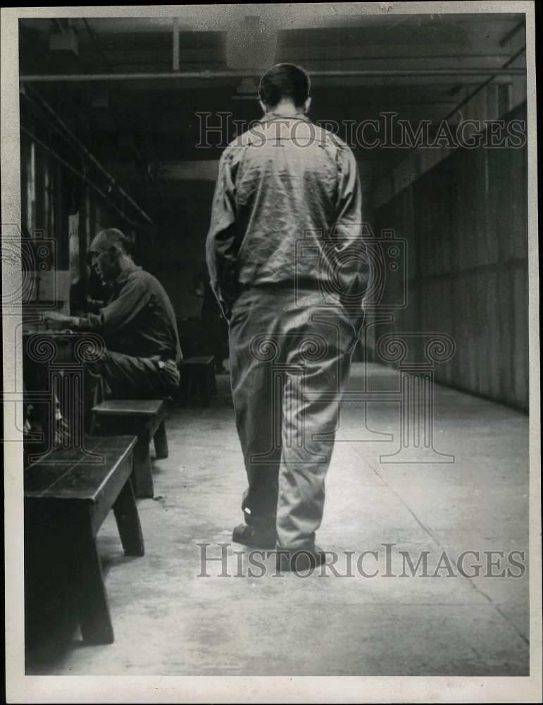 1967 Press Photo Man walks inside Bridgewater, Massachusetts State Hospital