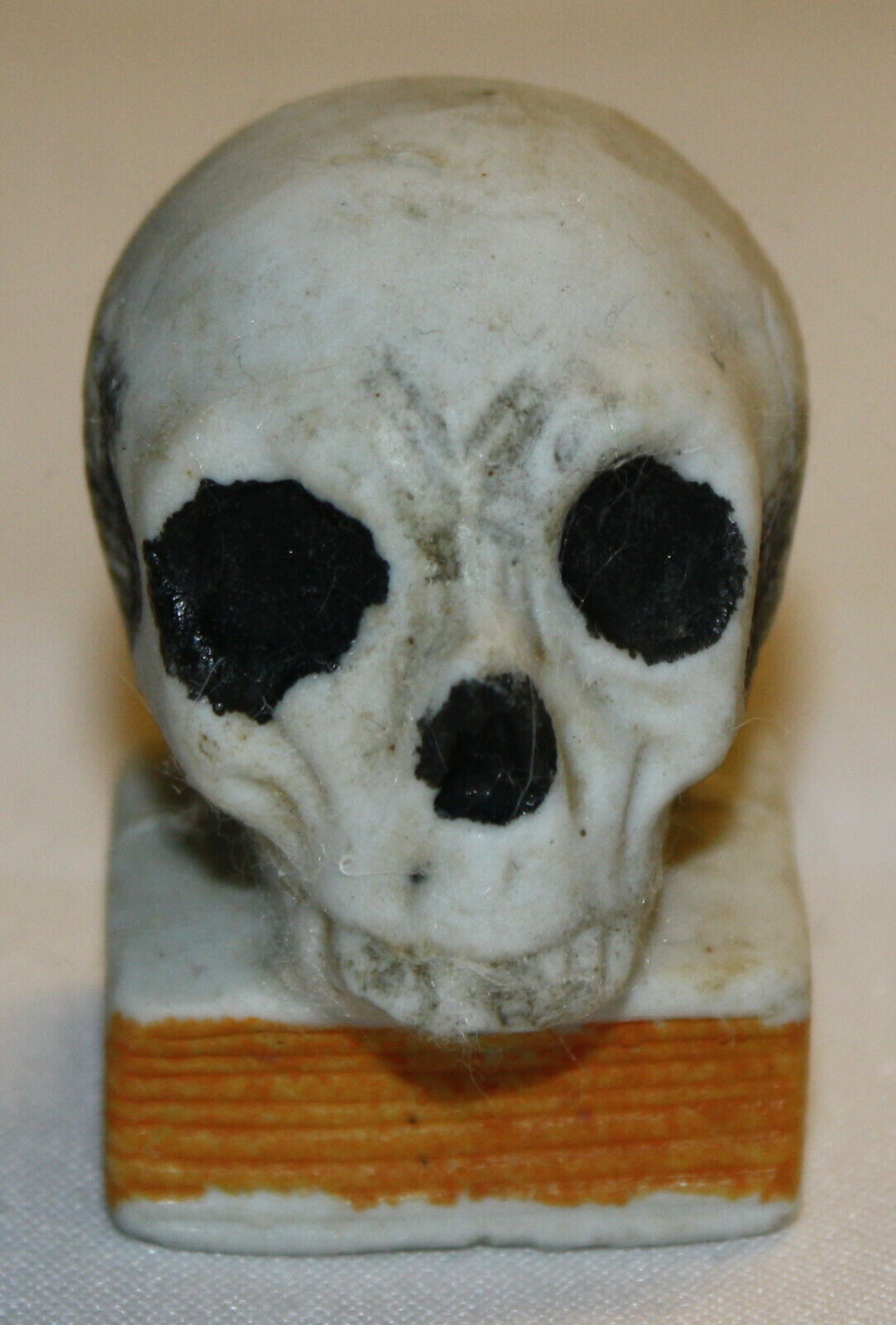 Antique or Vintage Japanese Ceramic Skull on Book
