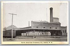 Oakes North Dakota~North America Creamery Co~Train Cars~1920s Postcard picture