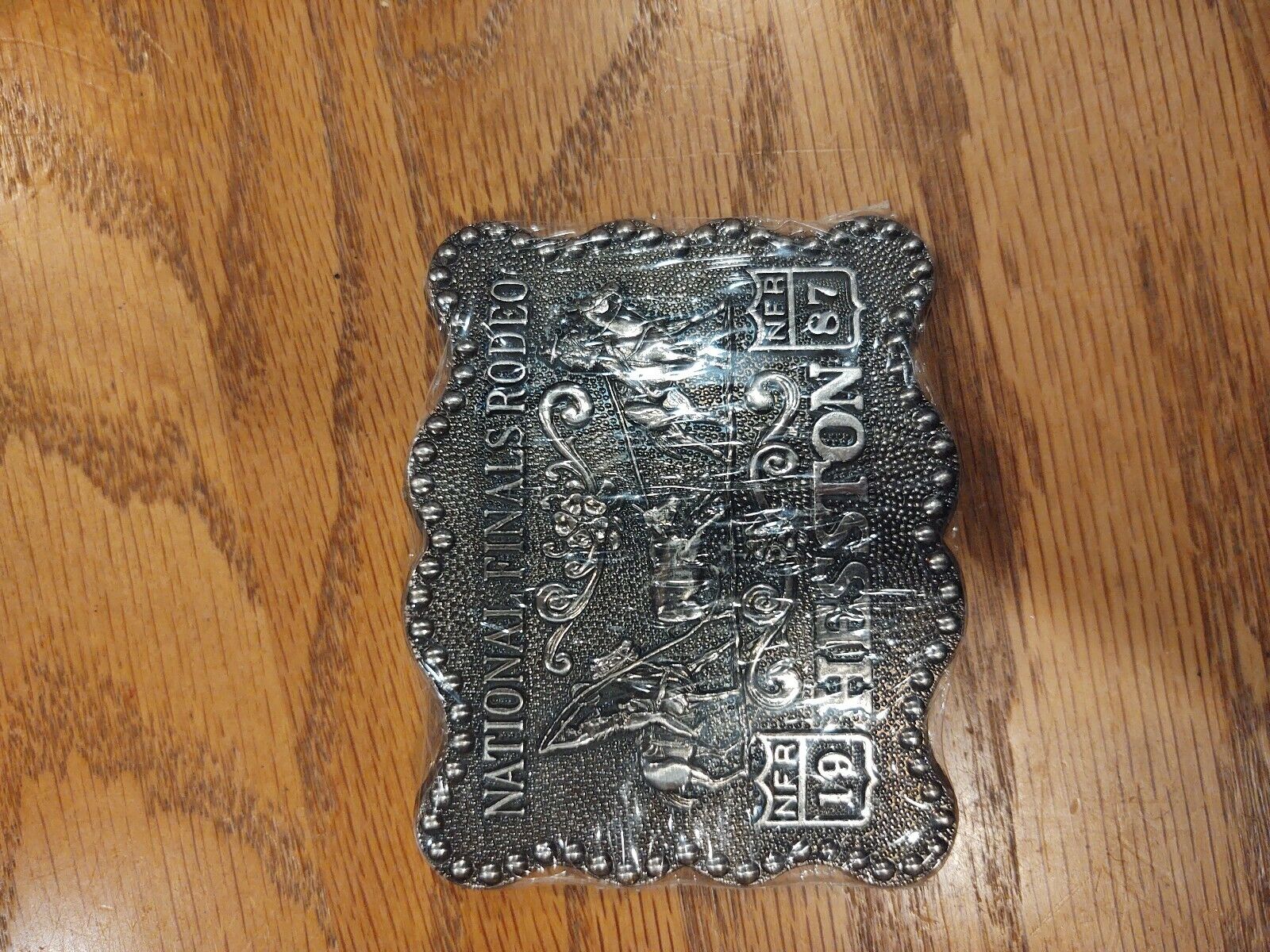 large 1987 Hesston Rodeo Belt Buckle National Finals Rodeo Showing Fred Fellows 
