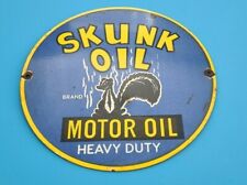VINTAGE SKUNK OIL PORCELAIN GAS MOTOR OIL SERVICE STATION PUMP PLATE SIGN picture