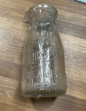 Vintage Russell Creamery Milk Bottle - 5 1/2” tall Superior Wis glass bottle picture