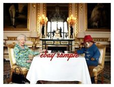 QUEEN ELIZABETH II PHOTO - Having tea with Paddington Bear at Buckingham Palace picture