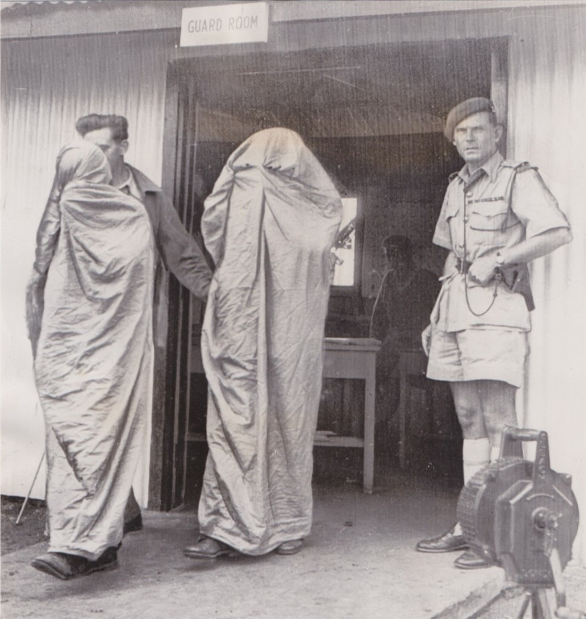 1954 Press Photo Hooded Informants after naming Mau Mau Terrorists at Langata 1954 Press Photo Hooded Informants after naming Mau Mau Terrorists at Langata