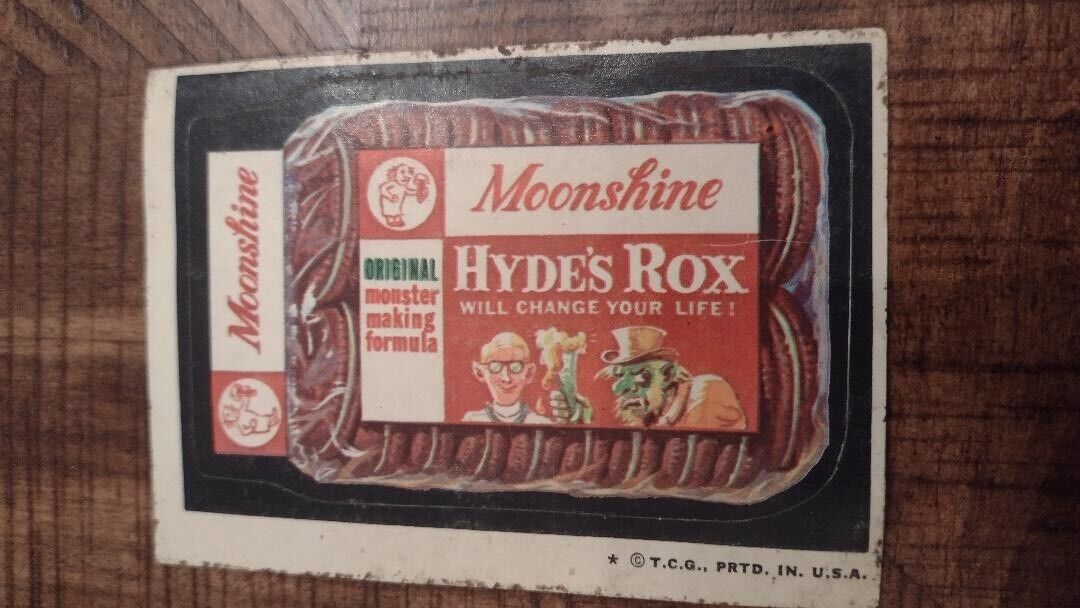 1973 Wacky Packages Series 5    MOONSHINE HYDE'S ROX    Tan Back
