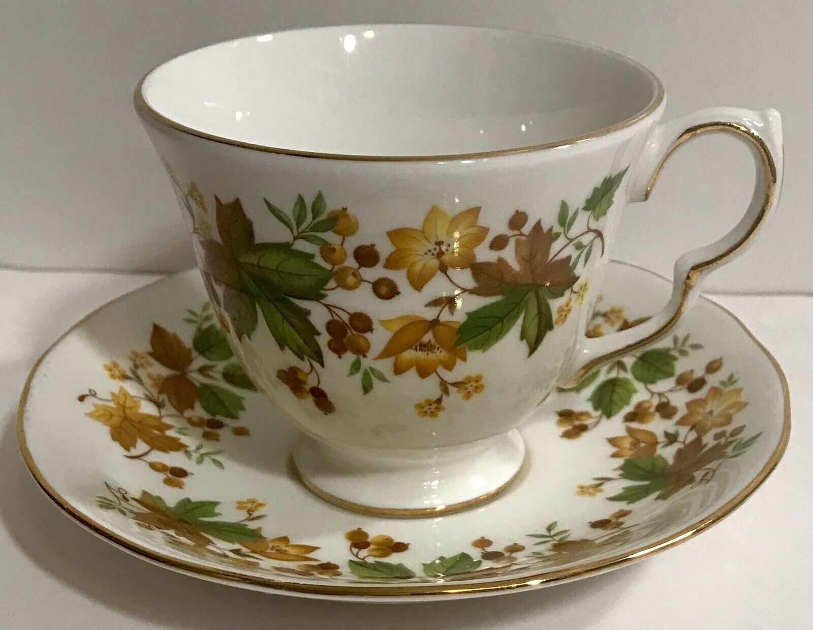 Queen Anne  Bone China White Lilies & Gold Tone  Tea Cup & Saucer