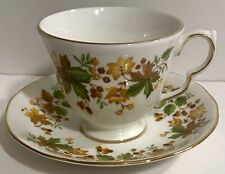 Queen Anne  Bone China White Lilies & Gold Tone Three-Legged Tea Cup & Saucer picture