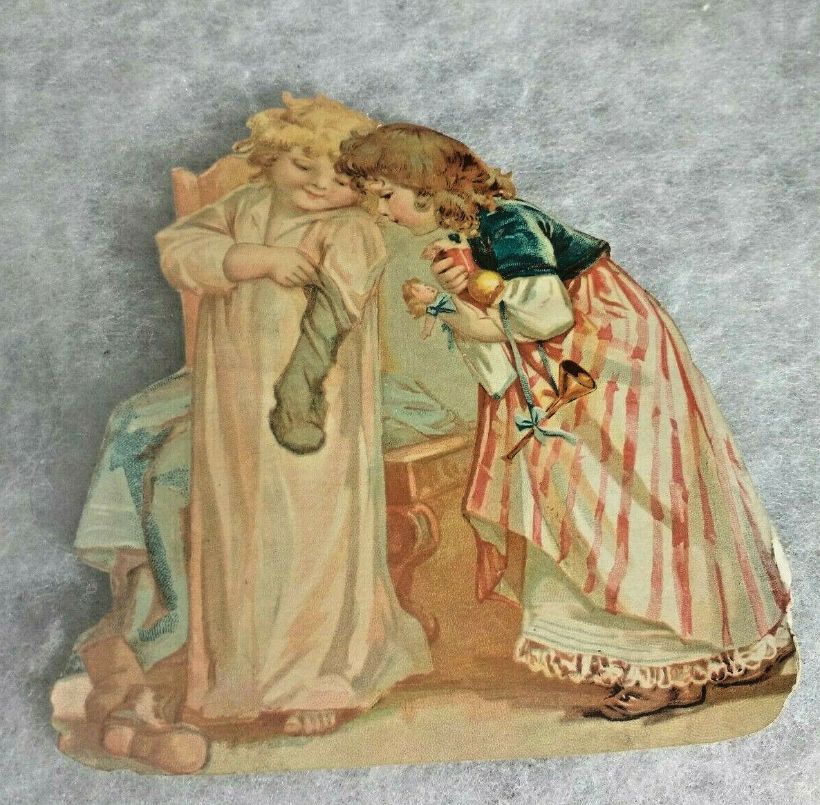 Victorian Scrap/Lion Coffee/Little Girls Looking at Christmas Stocking & Toys