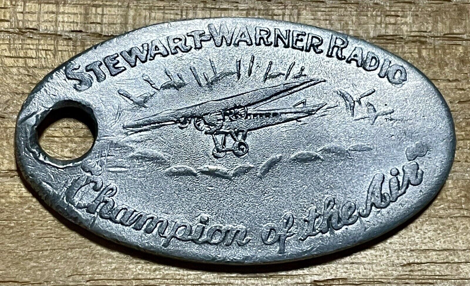Vintage Stewart Warner Radio Champion of the Air Advertising Keychain Fob Tag