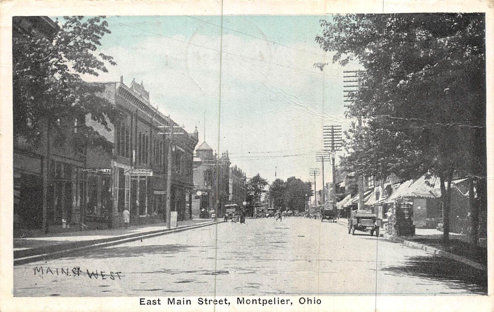 Main Street Montpelier, Ohio, 1921 - electrical poles, cars, buildings -POSTCARD