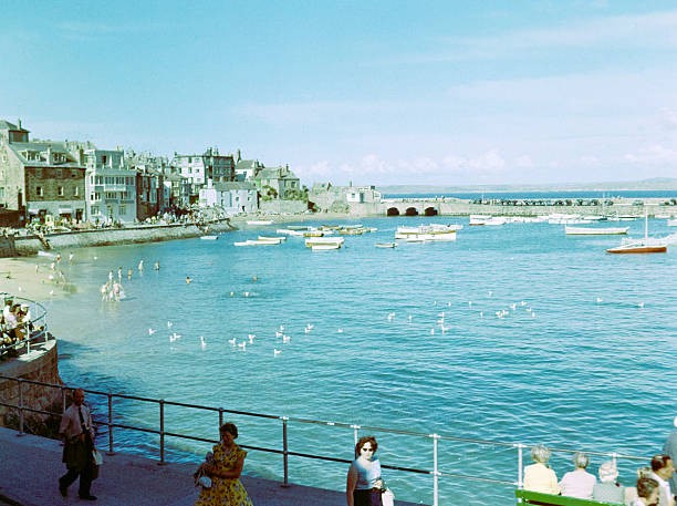 Boats moorings harbour people swimming sea beach St Ives Cornwall - Old Photo