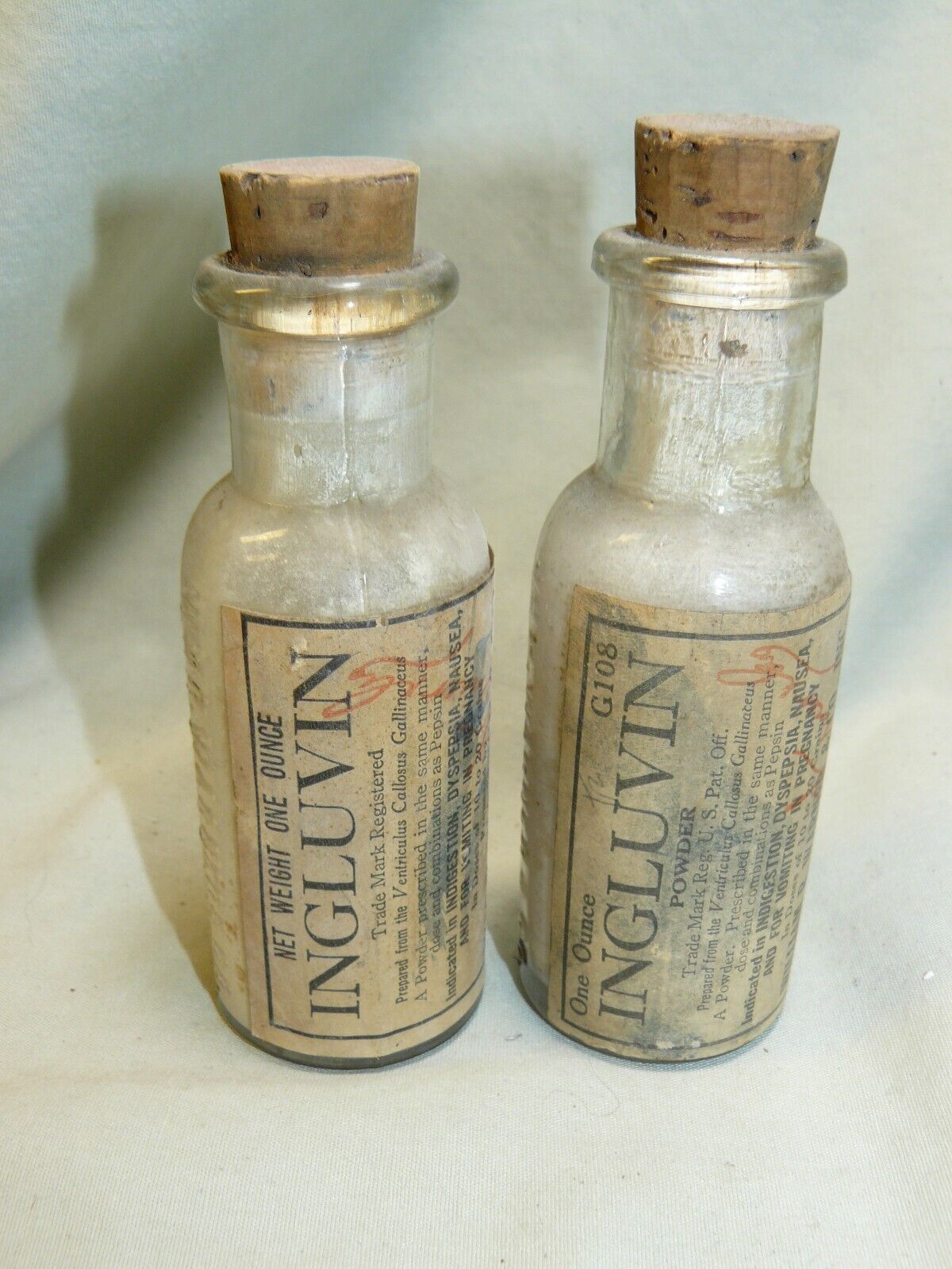 Pair of Antique Wm. R. Warner Ingluvin Bottles with Corks