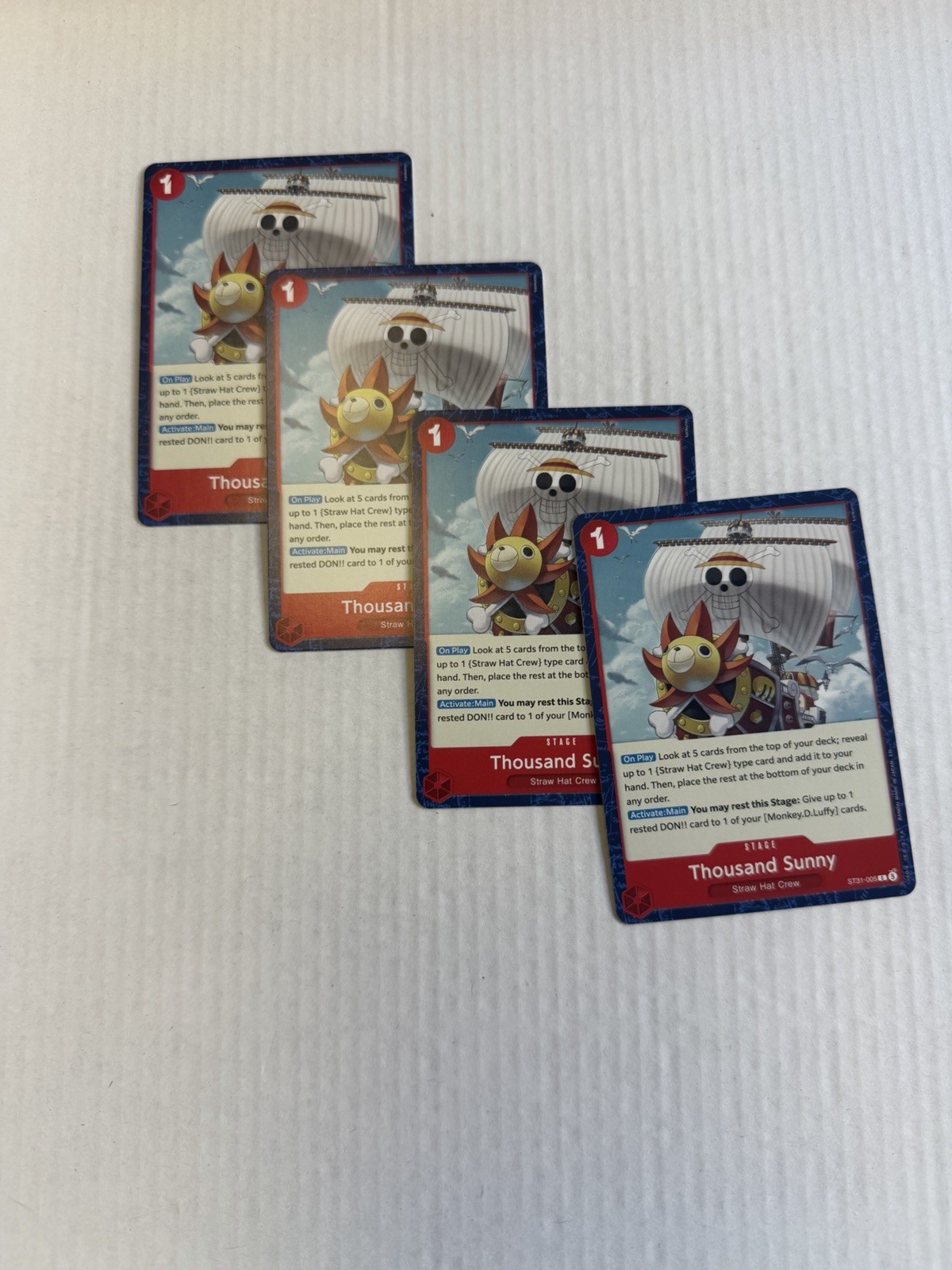 Thousand Sunny ST31-005 One Piece NM/ENG (Lot of 4) Play set Thousand Sunny ST31-005 One Piece NM/ENG (Lot of 4) Play set