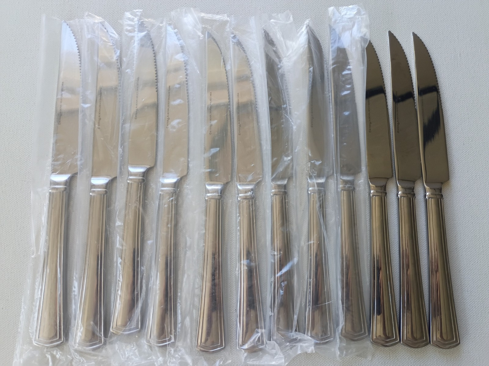 REED & BARTON WALDEN STAINLESS STEAK KNIVES SET OF 12 UNUSED REED & BARTON WALDEN STAINLESS STEAK KNIVES SET OF 12 UNUSED