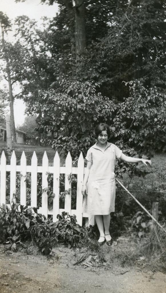 PP112 Vtg Photo YOUNG WOMAN BY WHITE PICKET FENCE, Wells MN c 1930\'s 40\'s
