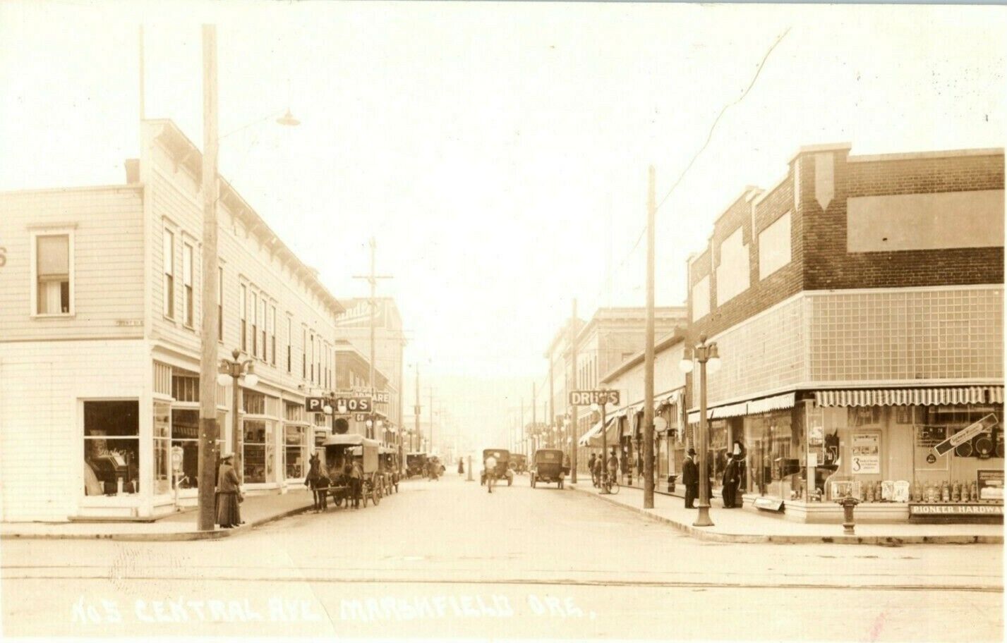 1918 Central Ave. Marshfield Oregon RPPC Photo Drugs Pianos Signs Postcard