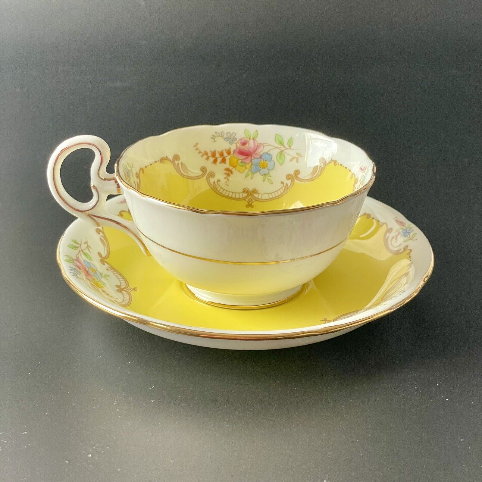 Royal Grafton Bone China Yellow Tea Cup Saucer Pink Blue Yellow Flowers England