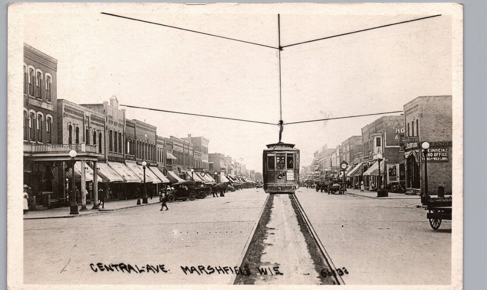 MARSHFIELD WI CENTRAL AVE TROLLEY real photo postcard rppc wisconsin main street