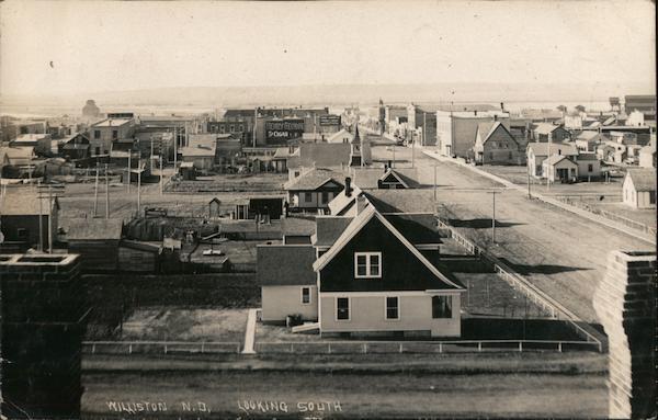 1909 RPPC Williston Looking South,houses and businesses,ND Williams County